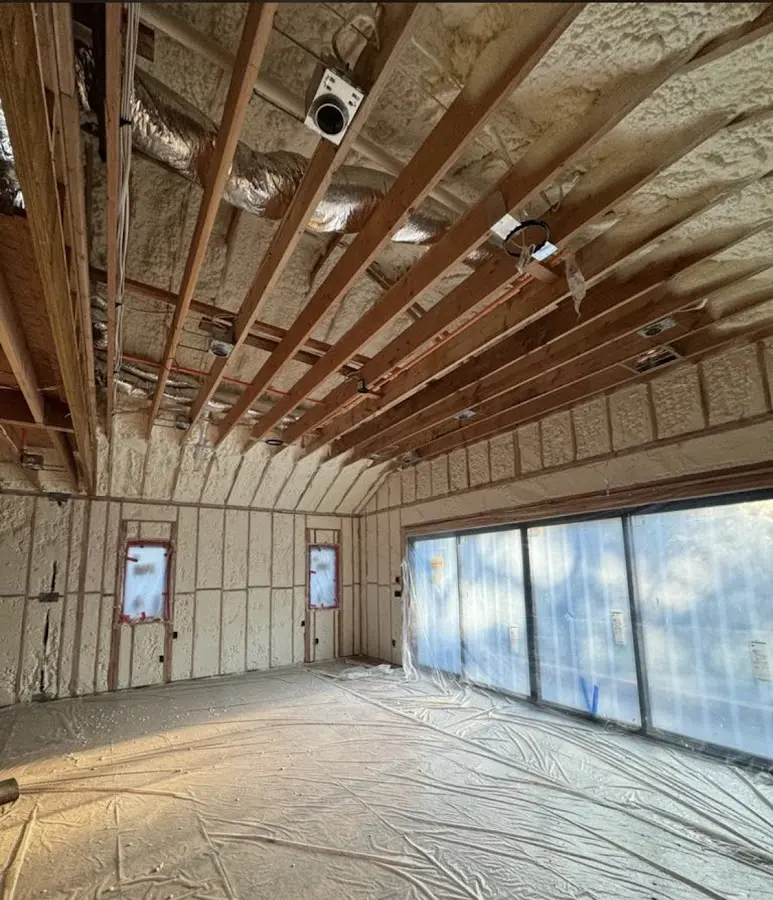 Interior walls and ceiling insulated with spray foam during new construction in Cherryville